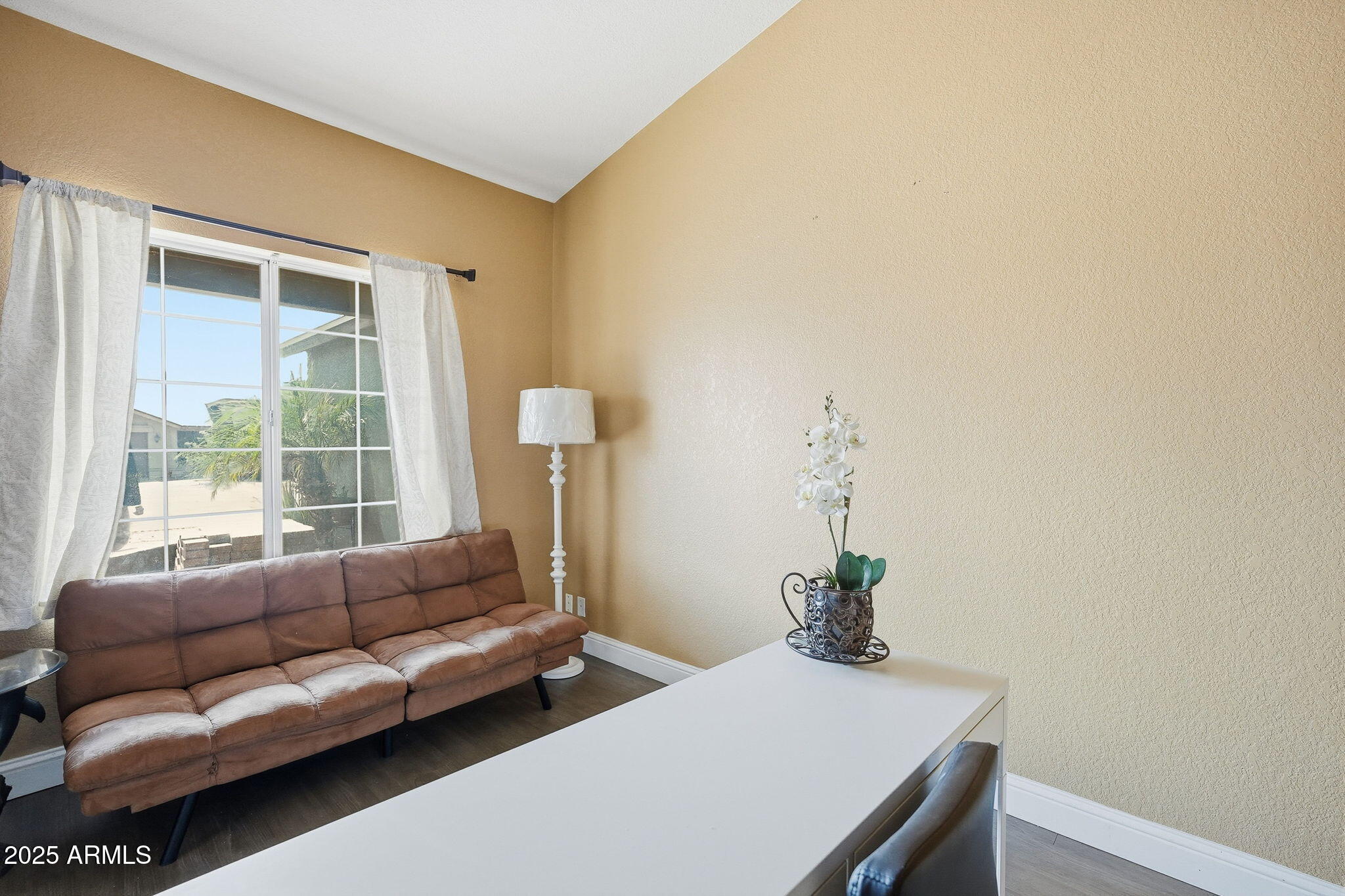 8730 West Ocotillo Road Glendale, AZ 85305 - Photo 12 of 58 a living room with furniture and a window
