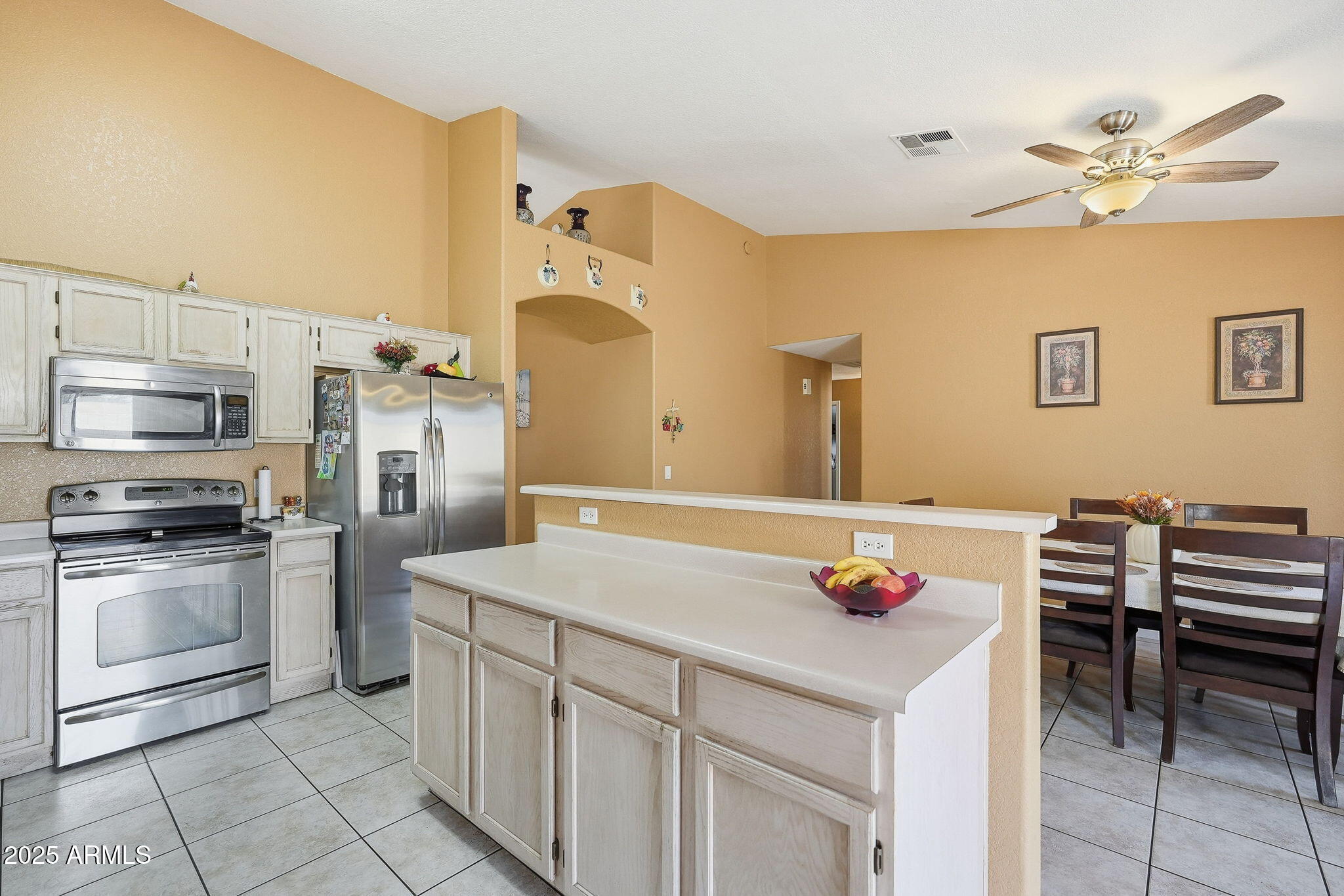 8730 West Ocotillo Road Glendale, AZ 85305 - Photo 19 of 58 a kitchen with a sink appliances and cabinets