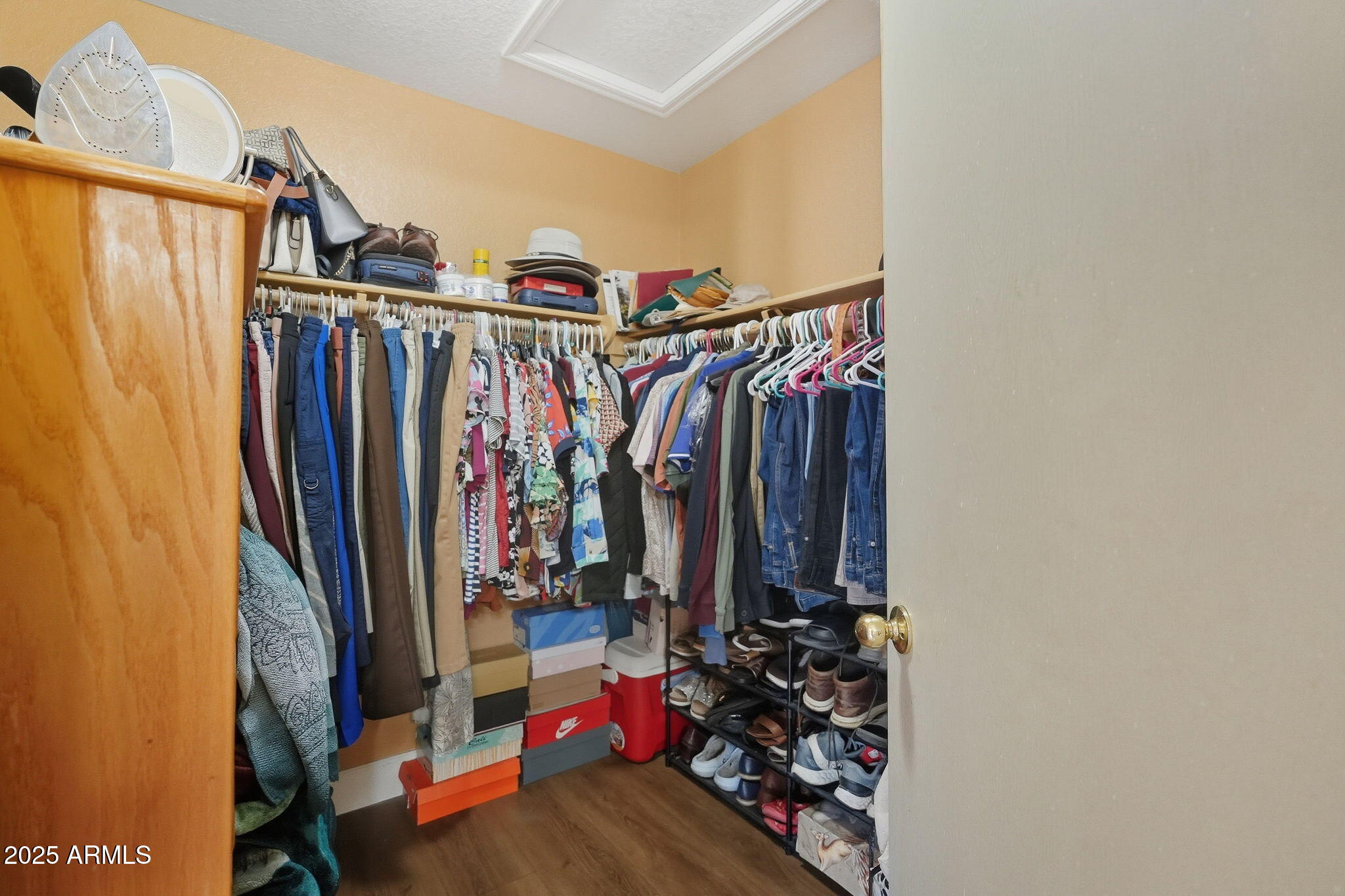 8730 West Ocotillo Road Glendale, AZ 85305 - Photo 34 of 58 a view of walk in closet with clothes