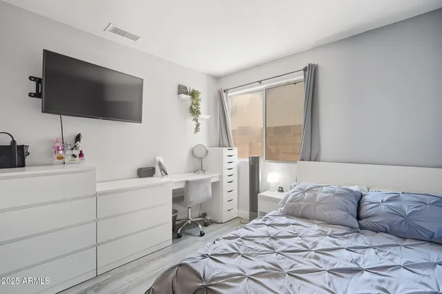 an aerial view of a house with a yard lake view and mountain view