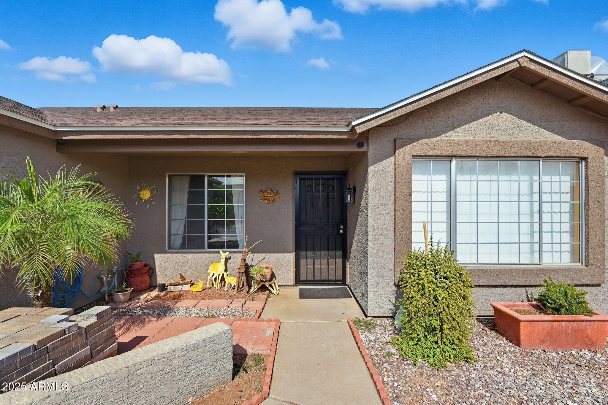 8730 West Ocotillo Road Glendale, AZ 85305 - Photo 4 of 58 a view of a house with sitting area and furniture