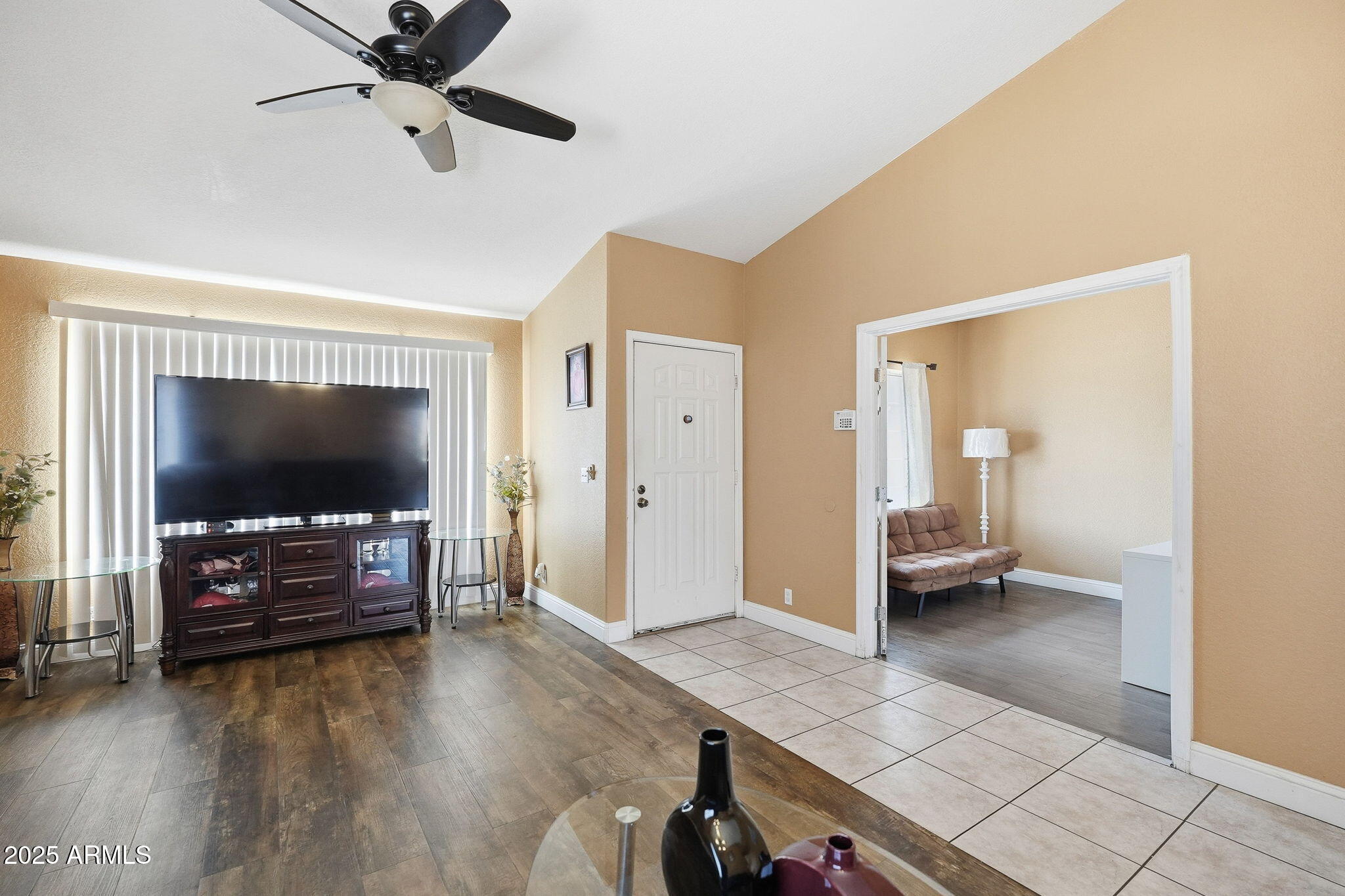8730 West Ocotillo Road Glendale, AZ 85305 - Photo 6 of 58 a living room with furniture and a flat screen tv