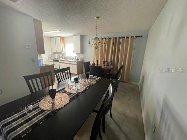 51 Foster Lane Palm Coast, FL 32137 - Photo 11 of 12 a view of a dining room with furniture