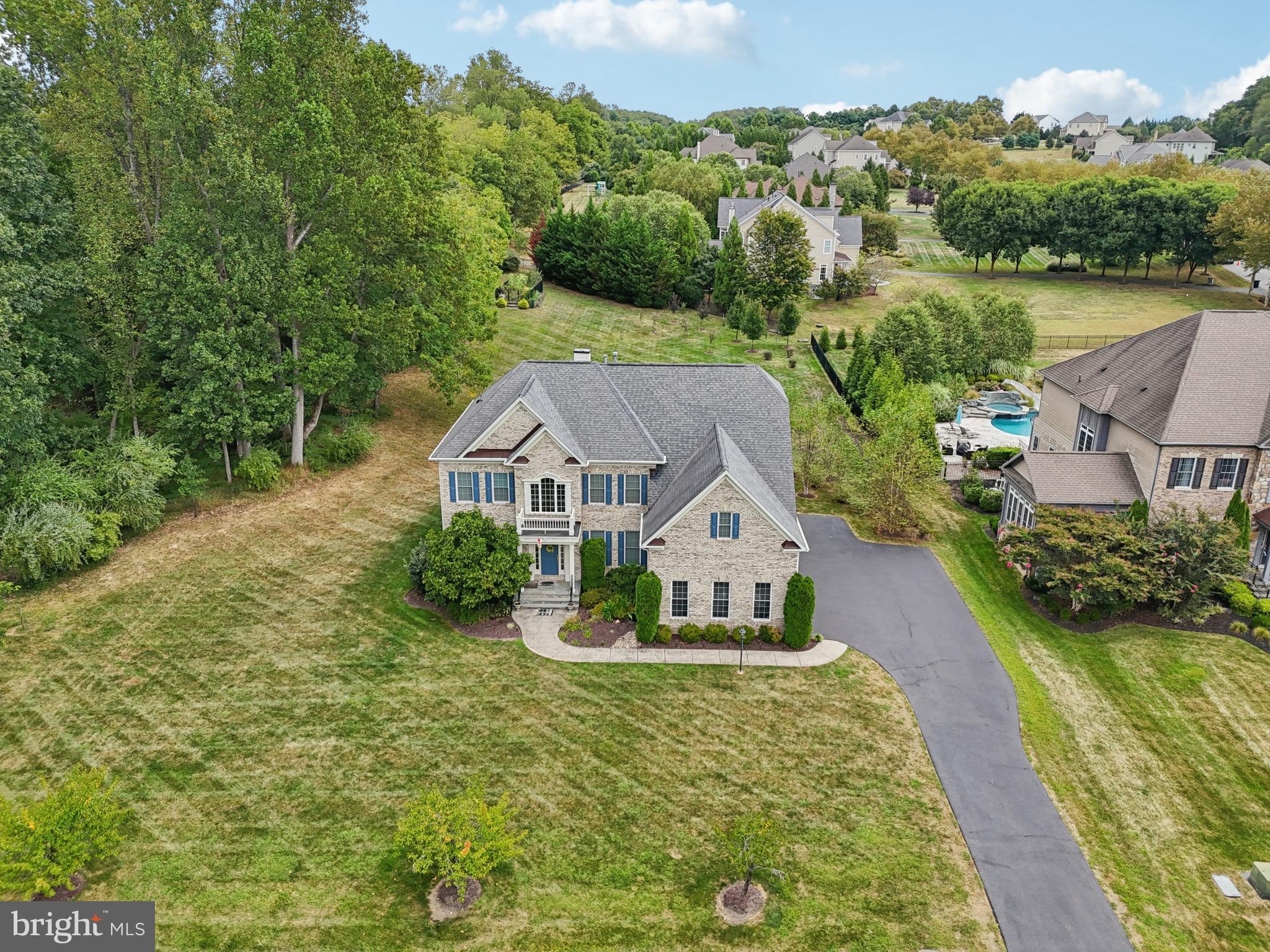 4884 Castlebridge Road Ellicott City, MD 21042 - Photo 103 of 130 an aerial view of a house with a yard
