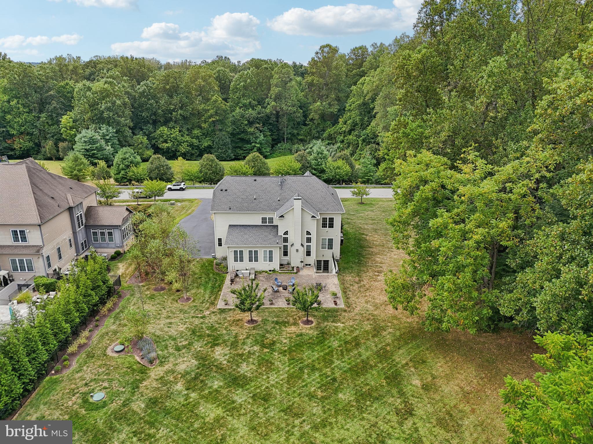 4884 Castlebridge Road Ellicott City, MD 21042 - Photo 119 of 130 an aerial view of a house with a yard