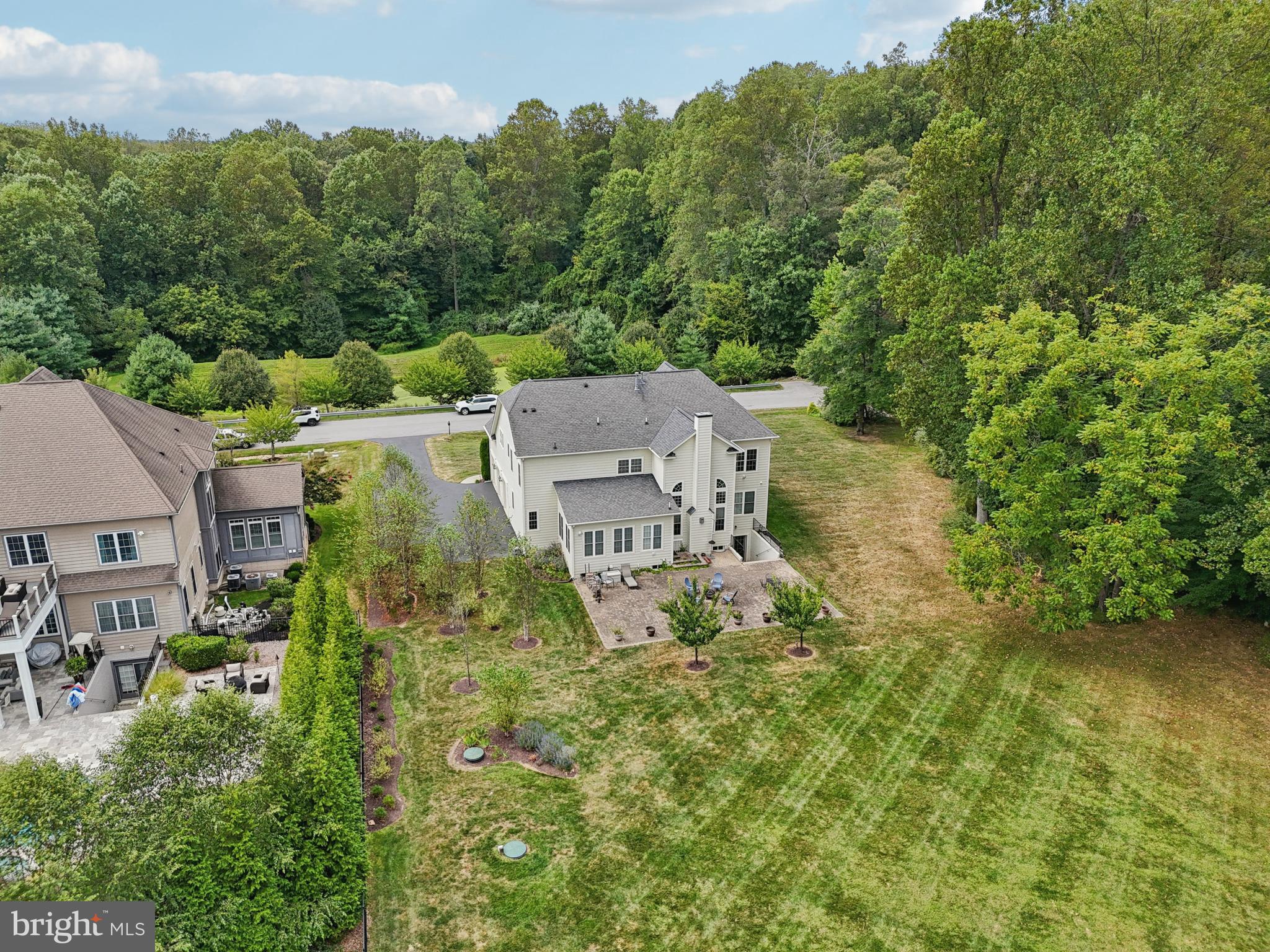 4884 Castlebridge Road Ellicott City, MD 21042 - Photo 120 of 130 an aerial view of residential house with outdoor space and trees all around