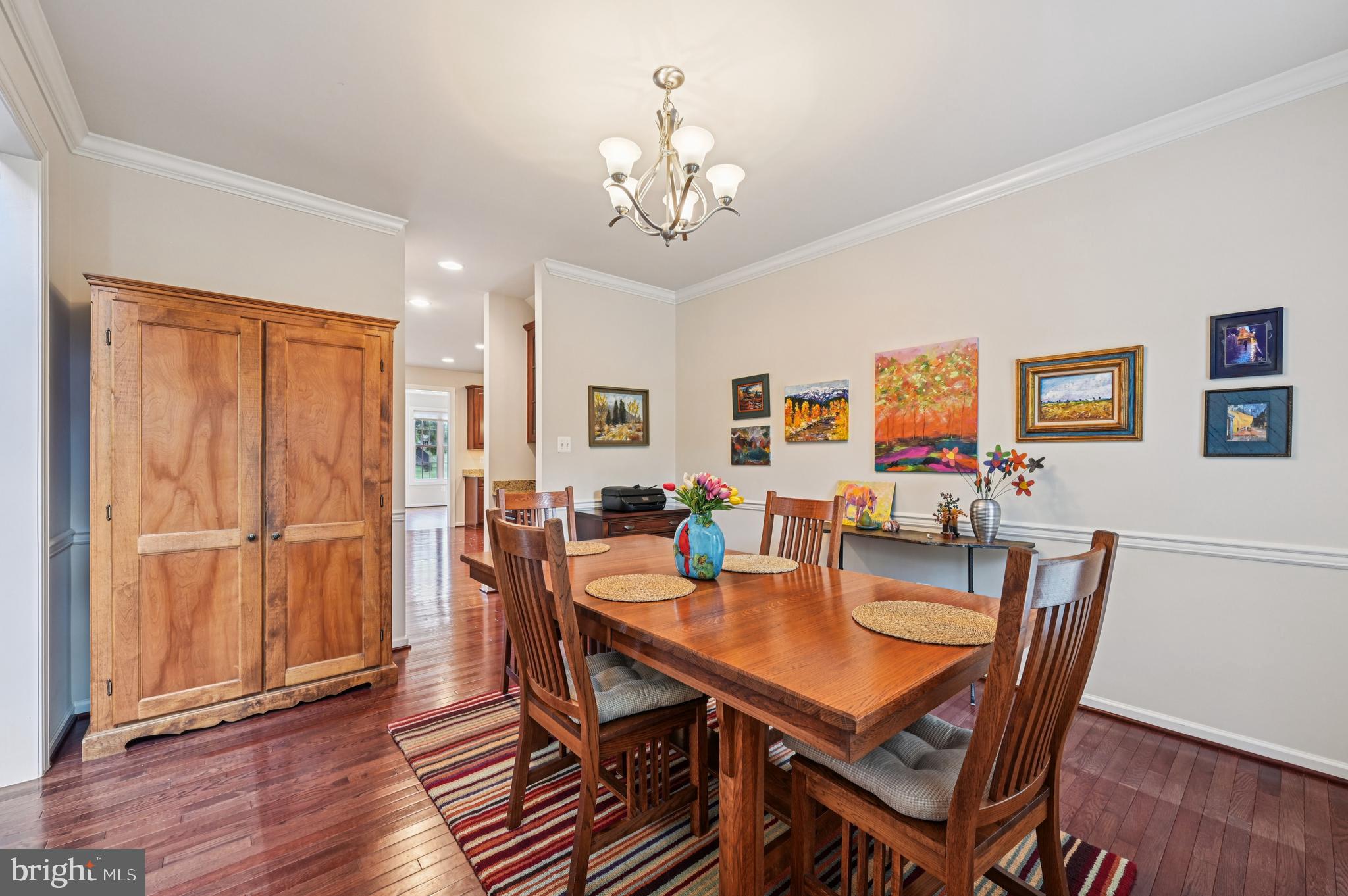 4884 Castlebridge Road Ellicott City, MD 21042 - Photo 22 of 130 a view of a dining room with furniture window and wooden floor