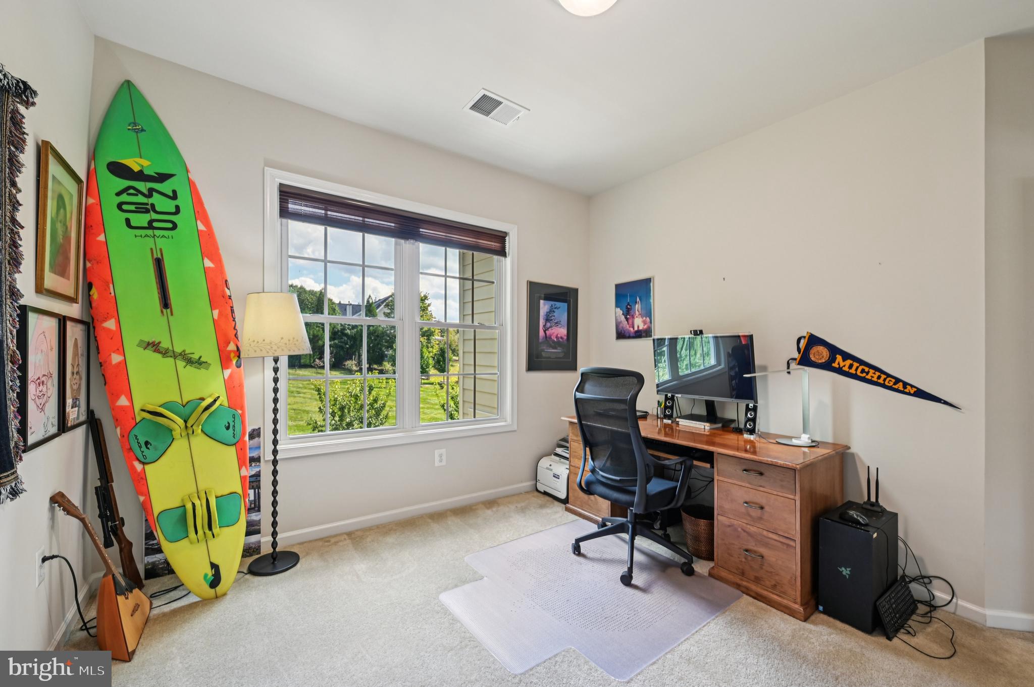 4884 Castlebridge Road Ellicott City, MD 21042 - Photo 77 of 130 a view of a workspace with furniture and a window