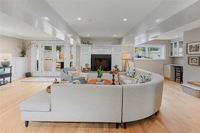 a bedroom with a bed and a potted plant