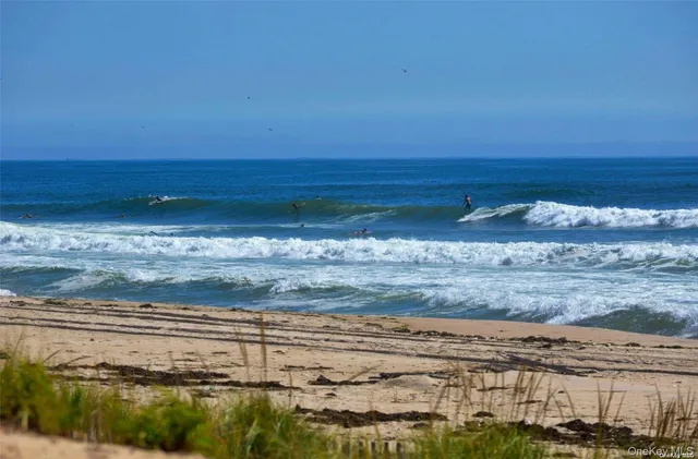 a view of a hallway with washer and dryer