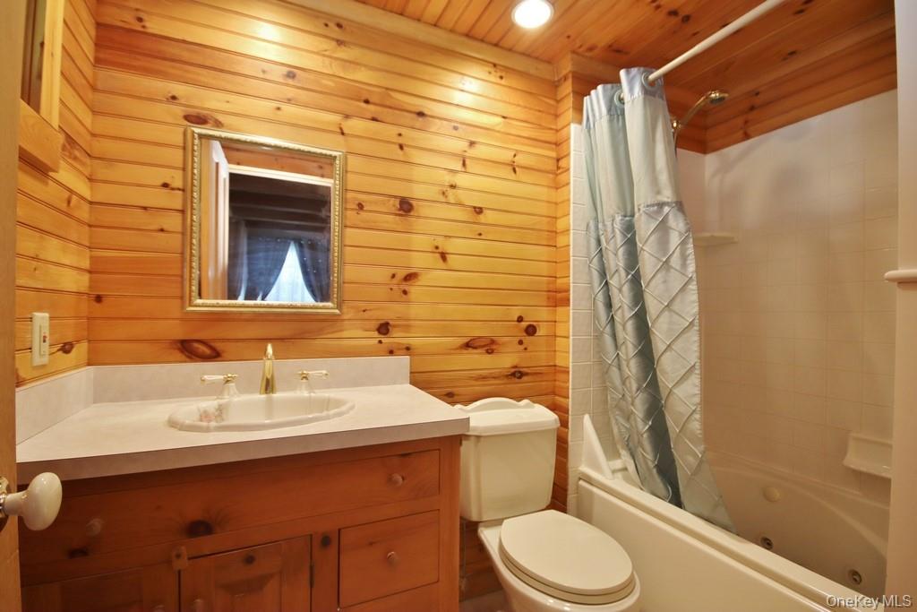 138 Round Hill Road Walden, NY 12586 - Photo 16 of 48 a bathroom with a sink toilet and shower