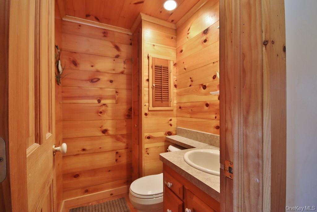 138 Round Hill Road Walden, NY 12586 - Photo 18 of 48 a bathroom with a sink a toilet and shower