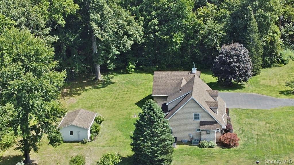 138 Round Hill Road Walden, NY 12586 - Photo 2 of 48 front view of house with a yard and trees
