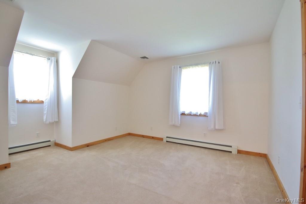 138 Round Hill Road Walden, NY 12586 - Photo 22 of 48 an empty room with windows