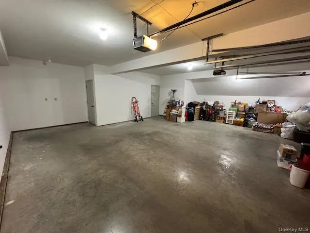 a view of a room with lots of gym equipment