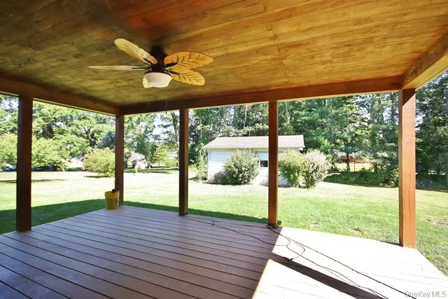 a view of a patio with a garden