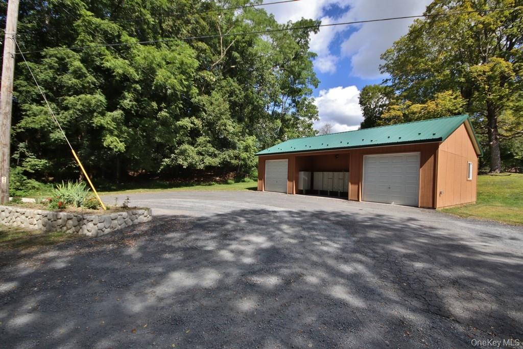 138 Round Hill Road Walden, NY 12586 - Photo 39 of 48 a view of a house with backyard and trees