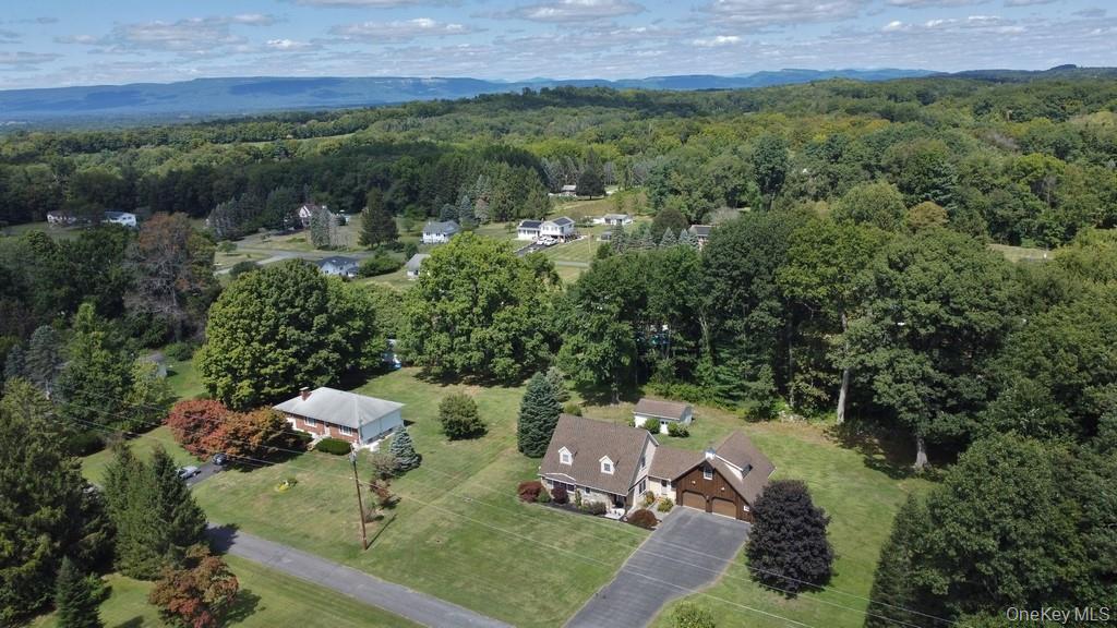 138 Round Hill Road Walden, NY 12586 - Photo 41 of 48 an aerial view of a house with a yard
