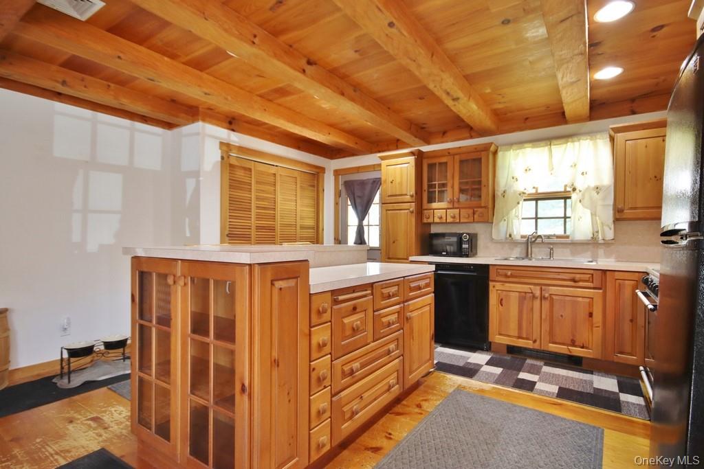 138 Round Hill Road Walden, NY 12586 - Photo 10 of 48 a kitchen with stainless steel appliances granite countertop a stove a sink and dishwasher