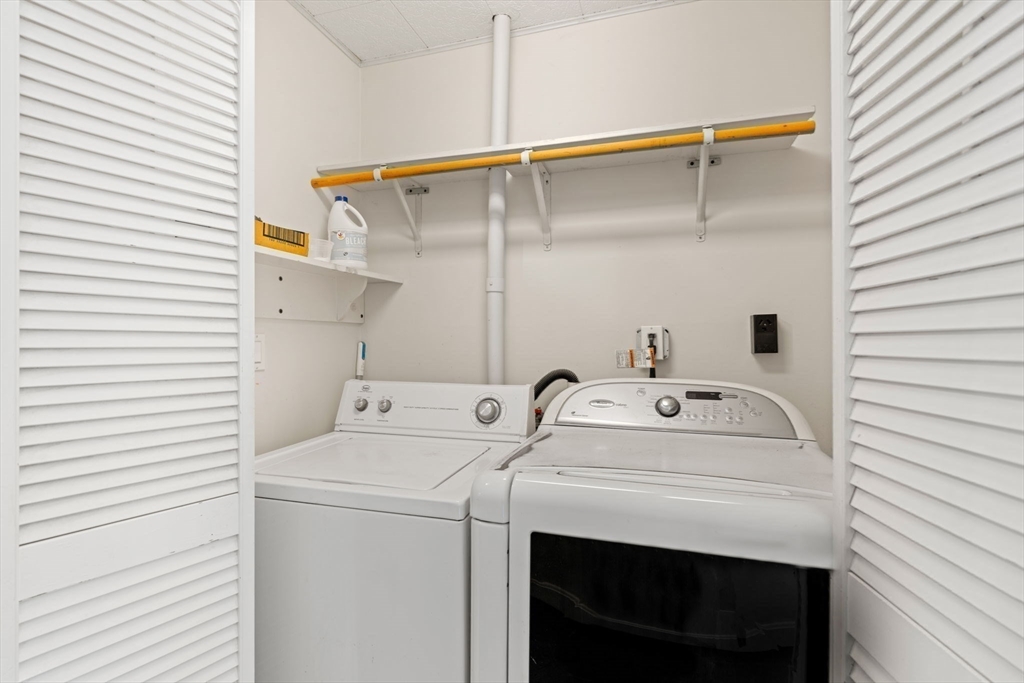 52 Middle Road Merrimac, MA 01860 - Photo 17 of 24 a utility room with dryer and washer