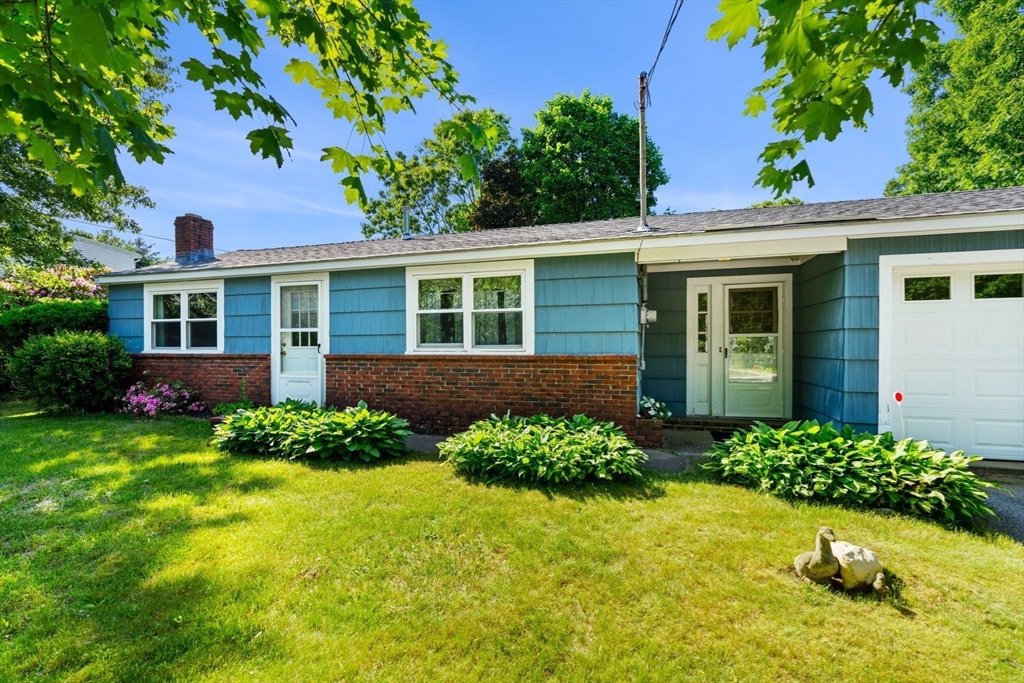 52 Middle Road Merrimac, MA 01860 - Photo 2 of 24 front view of a house with a yard