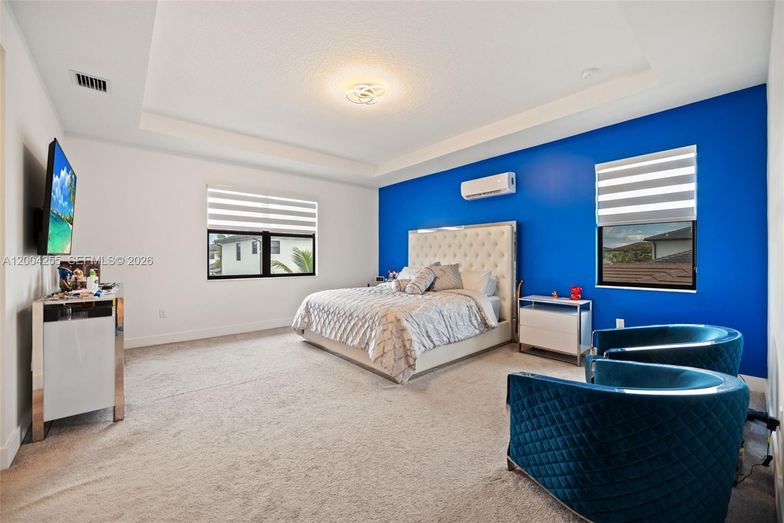 4366 Southwest 174th Avenue Miramar, FL 33029 - Photo 11 of 42 a bedroom with a bed and a couch