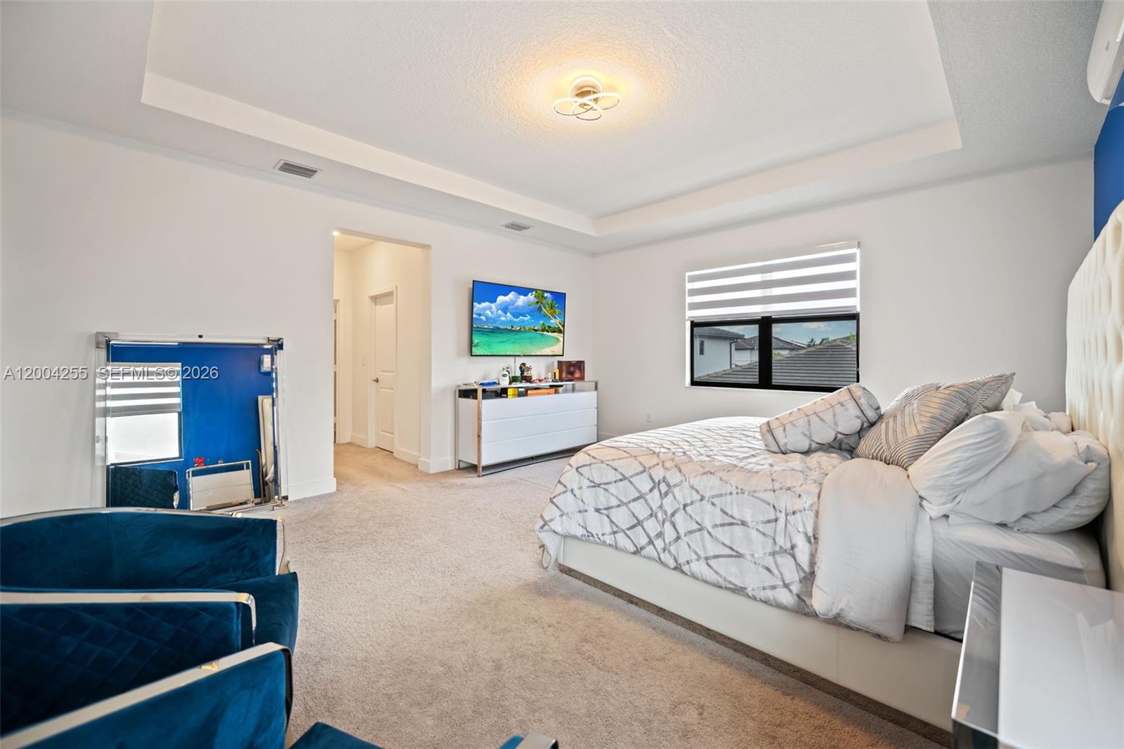 4366 Southwest 174th Avenue Miramar, FL 33029 - Photo 12 of 42 a bedroom with a bed and a dresser