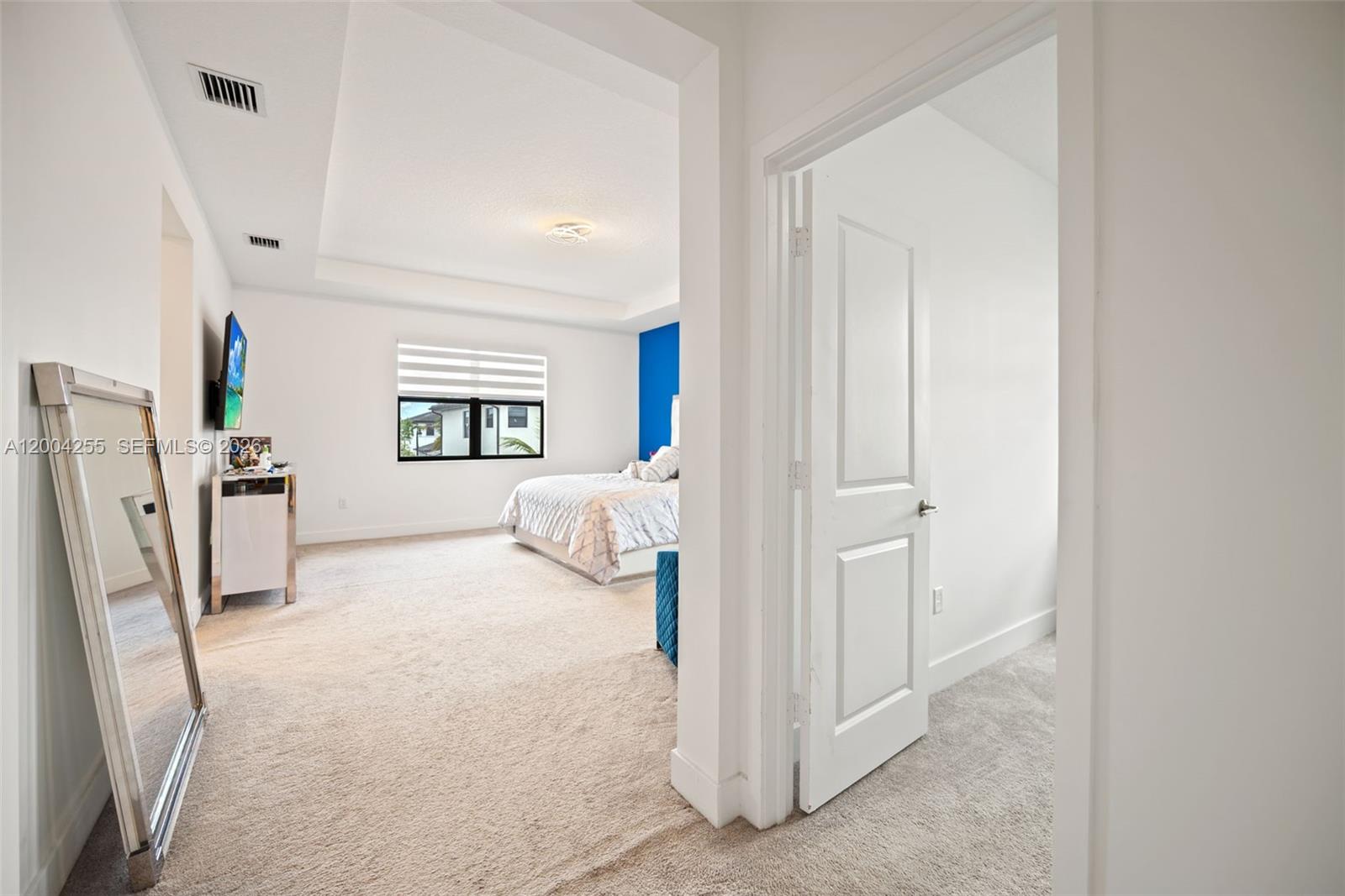 4366 Southwest 174th Avenue Miramar, FL 33029 - Photo 16 of 42 a bed room with a bed and a view of bedroom