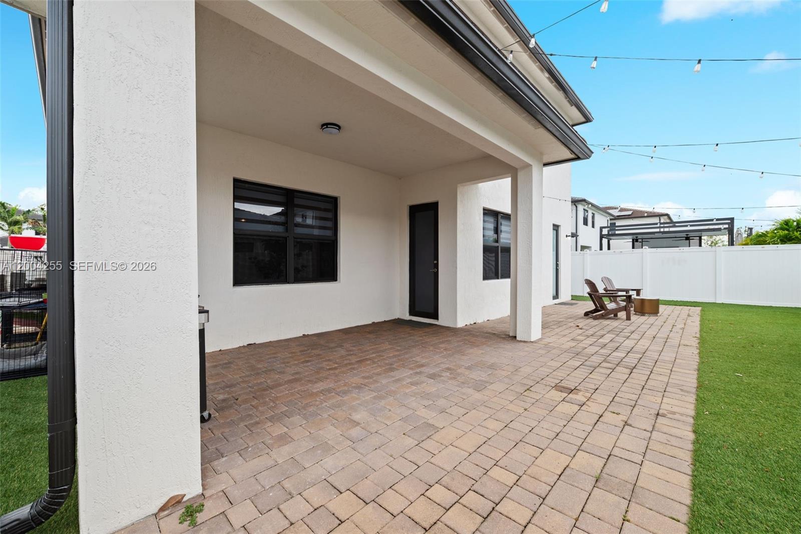 4366 Southwest 174th Avenue Miramar, FL 33029 - Photo 25 of 42 a view of a house with backyard and a garden
