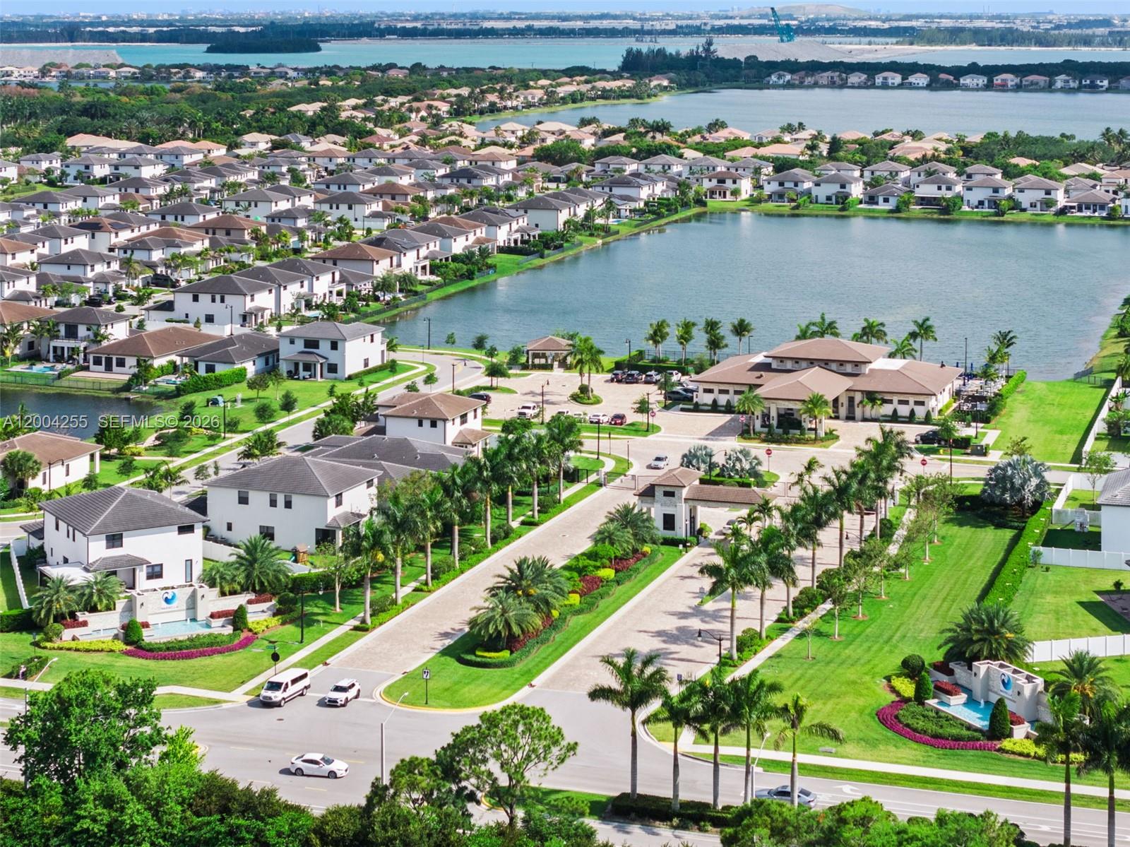 4366 Southwest 174th Avenue Miramar, FL 33029 - Photo 41 of 42 an aerial view of a city with lots of residential buildings lake and ocean view