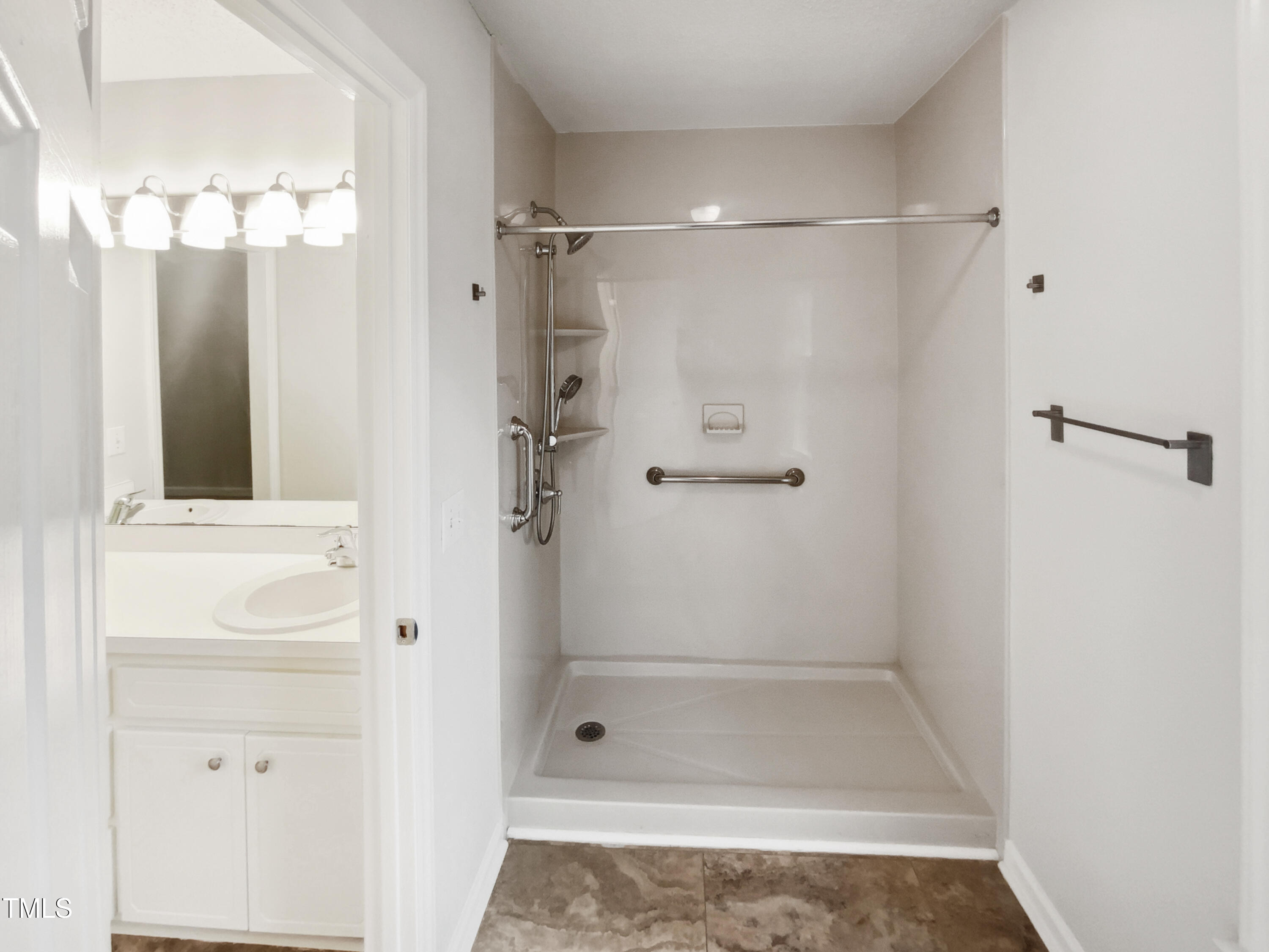 4205 Rockside Hills Drive Raleigh, NC 27603 - Photo 14 of 19 a bathroom with a shower