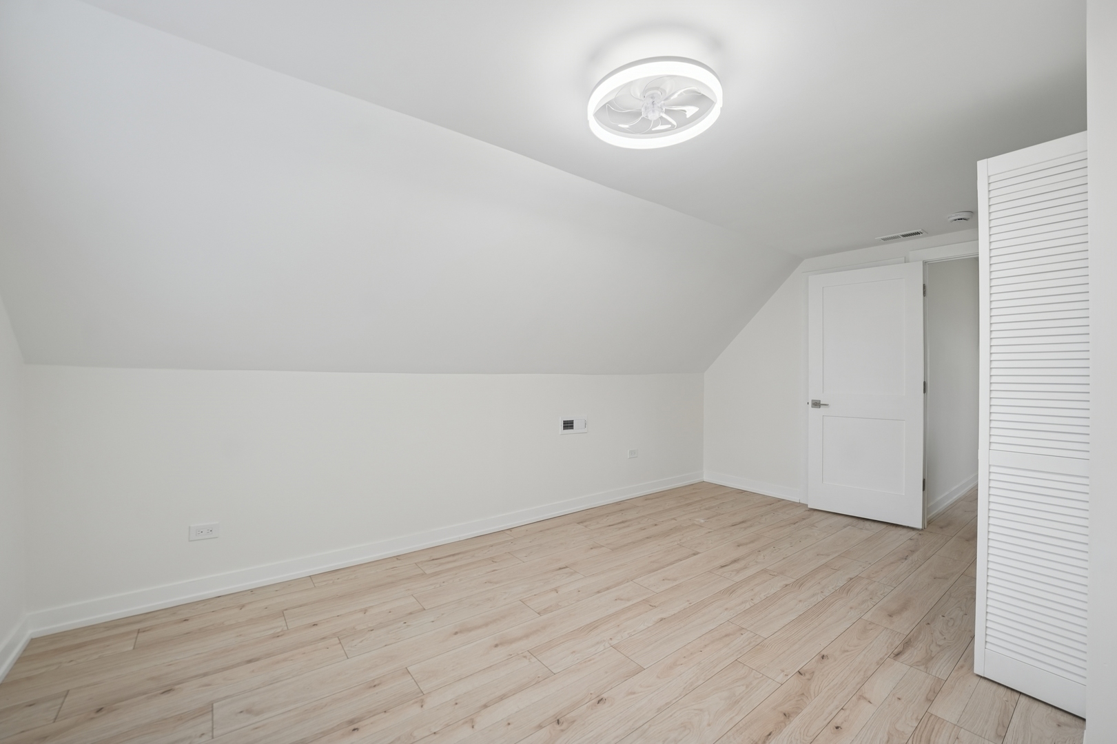 4954 West Byron Street Chicago, IL 60641 - Photo 12 of 33 a view of a room with wooden floor