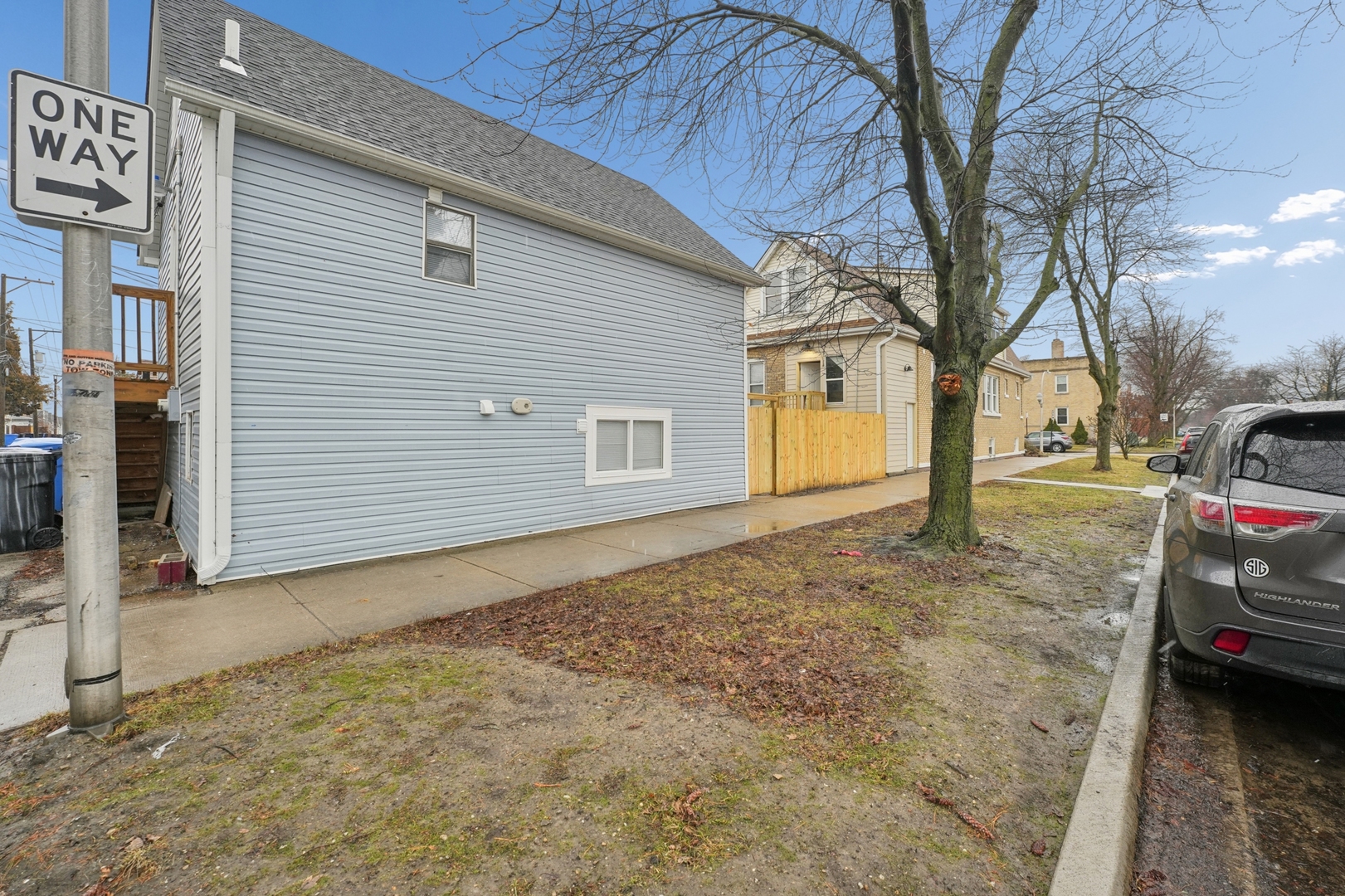 4954 West Byron Street Chicago, IL 60641 - Photo 19 of 25 a view of a yard with a tree