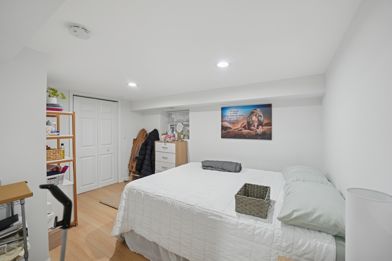 4954 West Byron Street Chicago, IL 60641 - Photo 20 of 33 a bedroom with a large bed and a book shelf