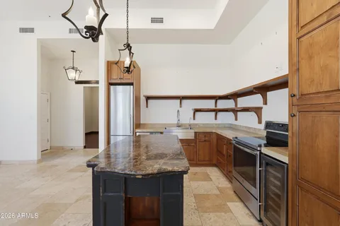 a view of wooden floor and wooden shelves