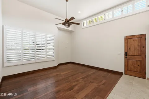 a bathroom with a granite countertop sink a shower and a mirror