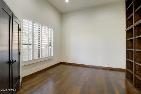 a view of a pathway with a tree