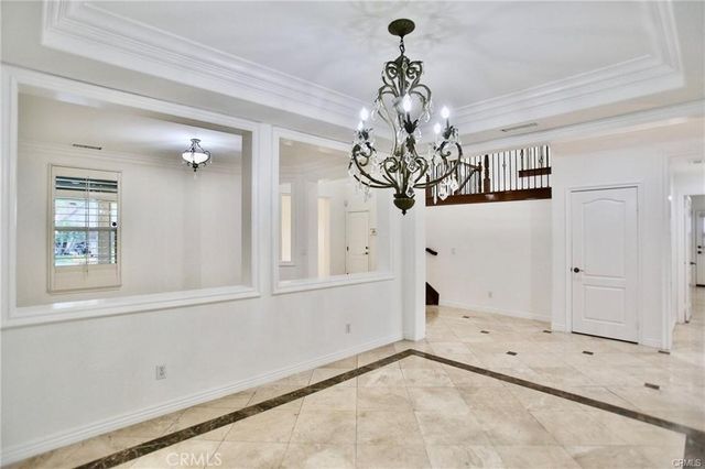 a view of a chandelier in a room