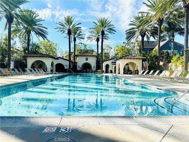 a view of a dining room with furniture and a fireplace