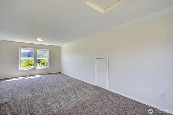 a view of an empty room with window