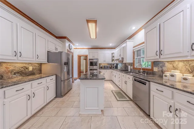a large kitchen with cabinets