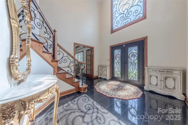 a view of entryway with a front door