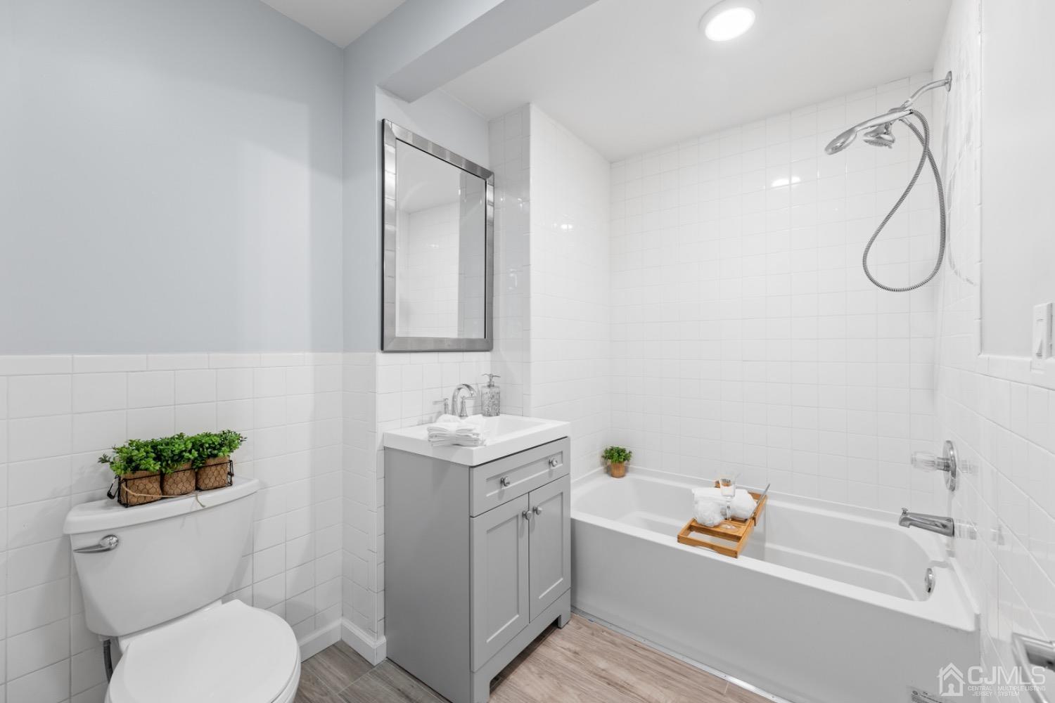 257 Matawan Avenue Matawan, NJ 07747 - Photo 11 of 28 a bathroom with a toilet sink and shower