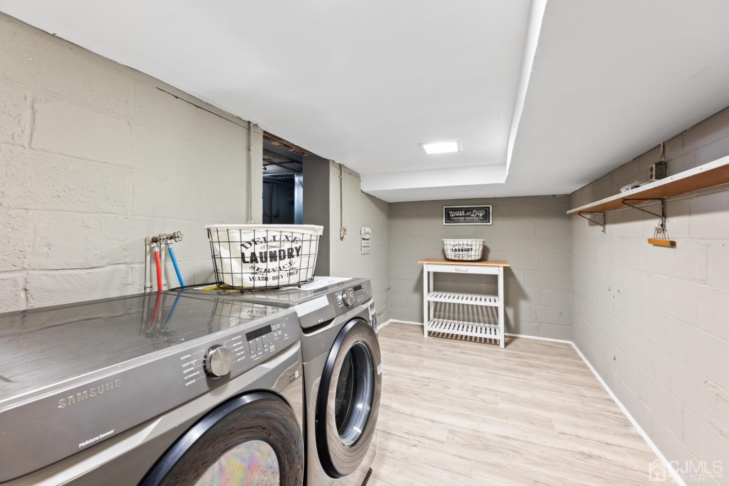 257 Matawan Avenue Matawan, NJ 07747 - Photo 12 of 28 a view of a storage & utility room with washer and dryer