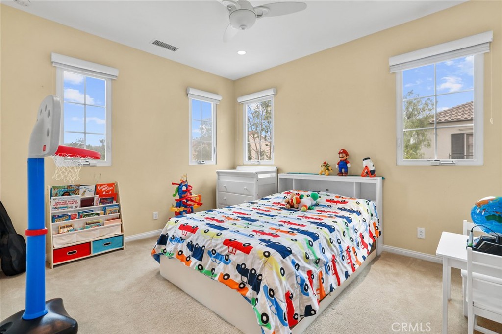 118 Chestnut Grove Irvine, CA 92620 - Photo 13 of 16 a bedroom with bed and a window