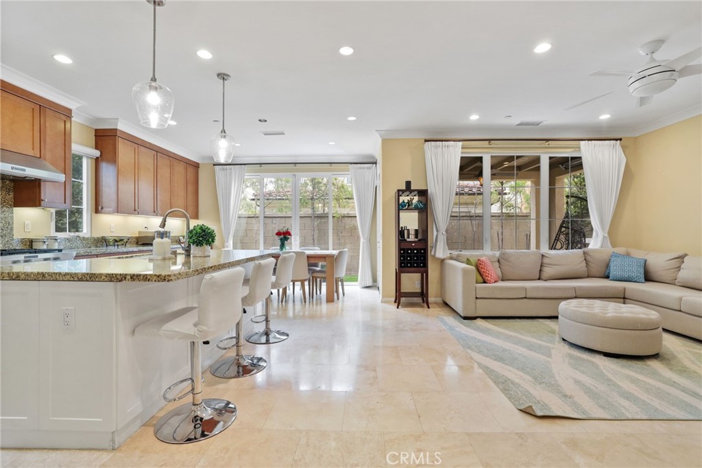 118 Chestnut Grove Irvine, CA 92620 - Photo 3 of 16 a living room with furniture kitchen and a large window