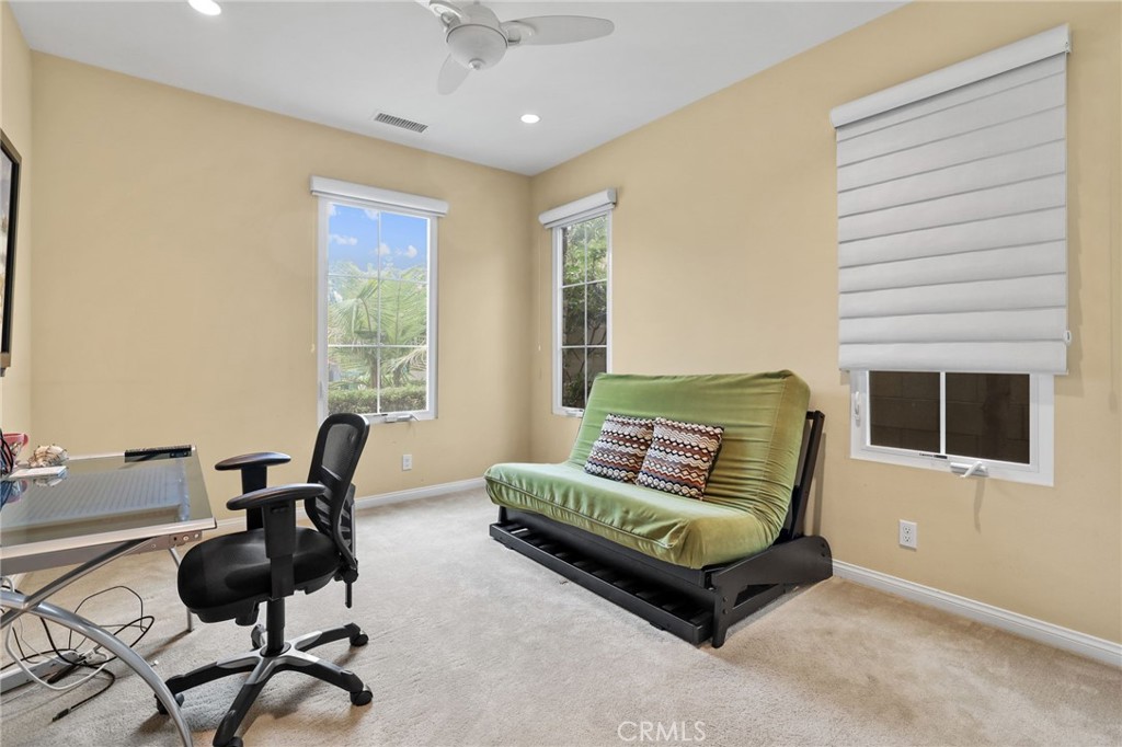 118 Chestnut Grove Irvine, CA 92620 - Photo 9 of 16 a living room with furniture and a flat screen tv