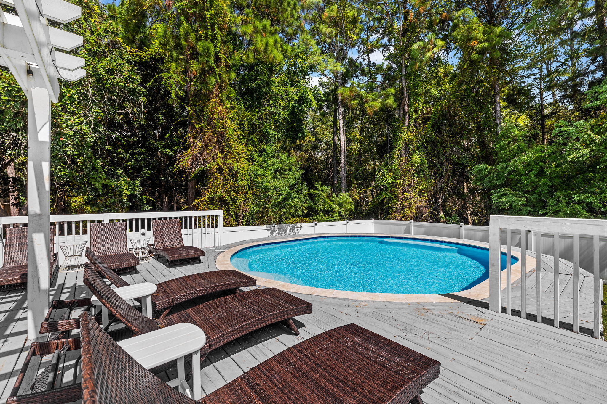 429 Montigo Avenue Santa Rosa Beach, FL 32459 - Photo 18 of 62 a view of a chairs and table on the wooden floor