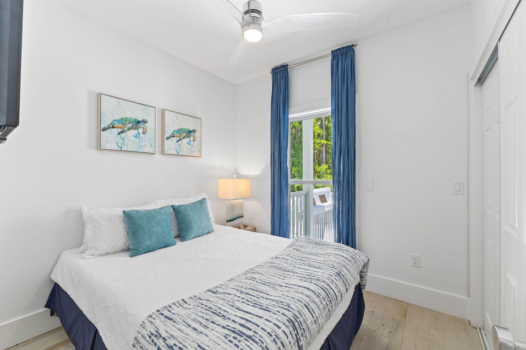 429 Montigo Avenue Santa Rosa Beach, FL 32459 - Photo 24 of 62 a bedroom with a bed and a painting on the wall