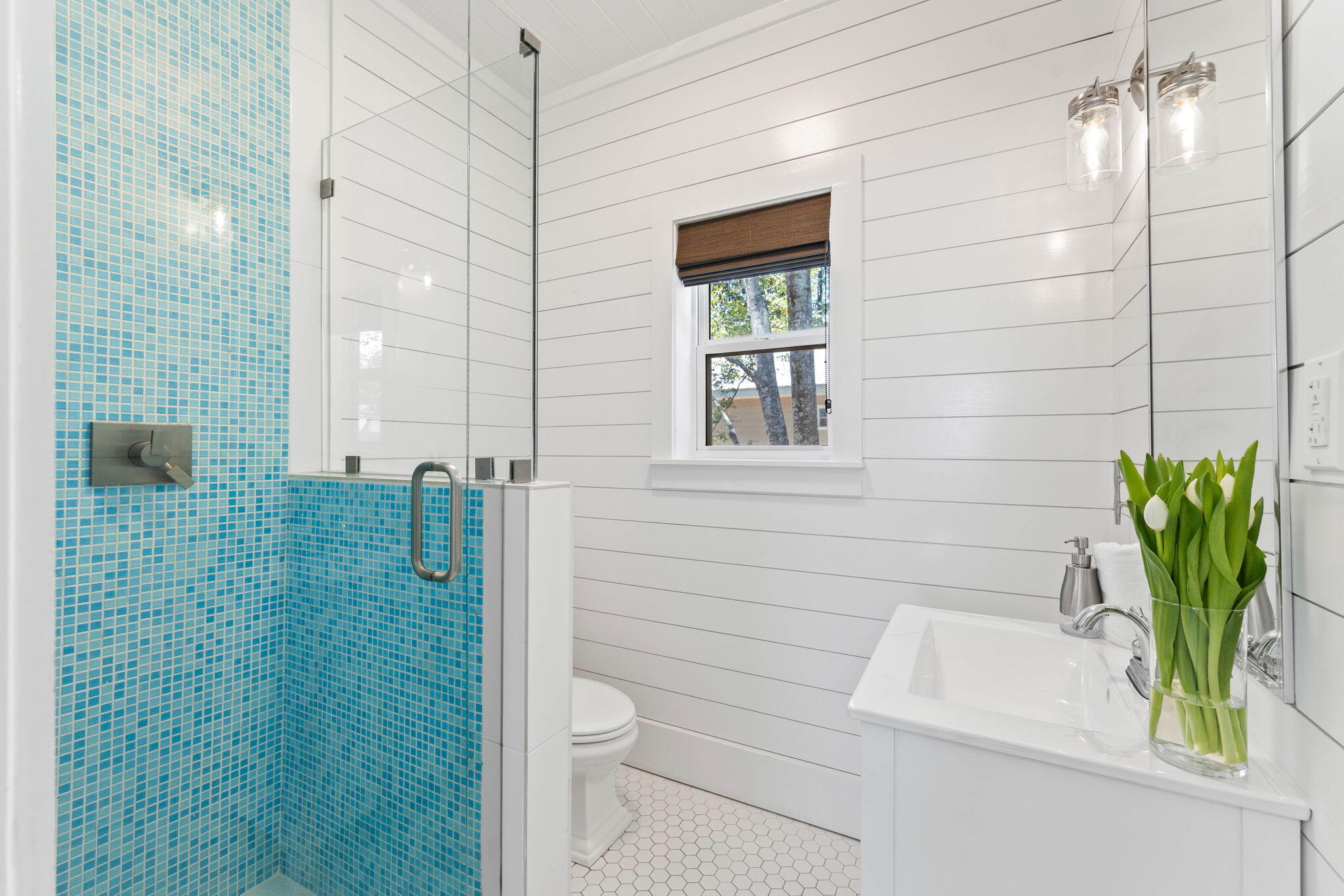 429 Montigo Avenue Santa Rosa Beach, FL 32459 - Photo 25 of 62 a bathroom with a sink a toilet and shower